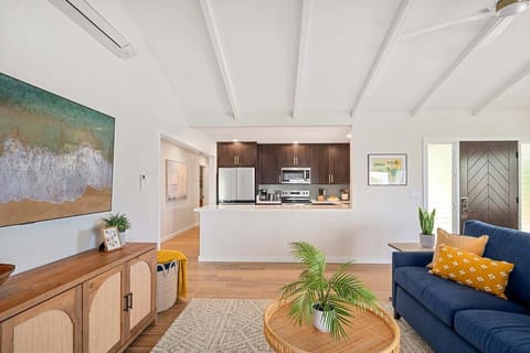 Relax in a stylish lounge featuring a cozy sofa and open-concept design.