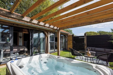 The Moet....a serene and romantic countryside lodge with hot tub just a couple of miles outside the city of Chichester.