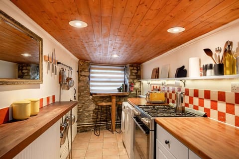 Please note, the kitchen has a low ceiling.