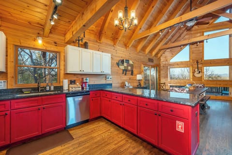 Enjoy breathtaking views through expansive windows while you cook and dine in our beautifully designed kitchen.