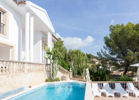 Private pool with sun terrace and loungers at Villa Ocean View in Portals Nous.