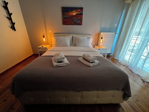 Apartment, City View | 2 bedrooms, in-room safe, soundproofing, iron/ironing board