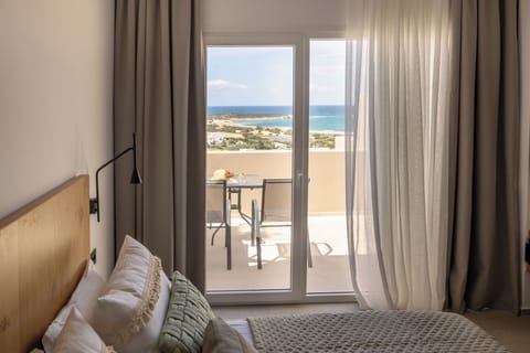 Deluxe Suite, Balcony, Sea View | Terrace/patio
