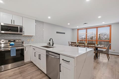 Modern kitchen with amazing views, fully equipped for your culinary adventures