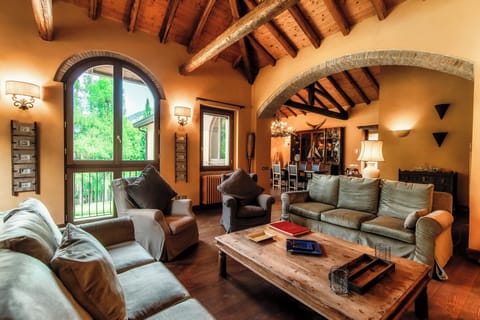 Villa, Patio | Living area | 30-inch TV with digital channels