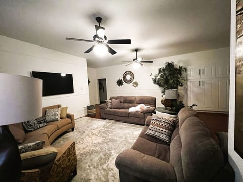 Guests love this room! The high ceilings make it even more spacious. The TV is 60’ and has a dvd player with dvd choice available.