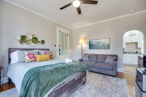 Drift off to dreamland in our cozy queen bed, outfitted with plush linens for a restful night's sleep.