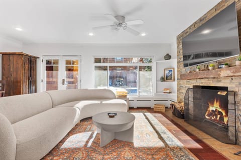 You will enjoy relaxing in the living area in front of the woodburning fireplace as you watch your favorite tv show or sporting event.