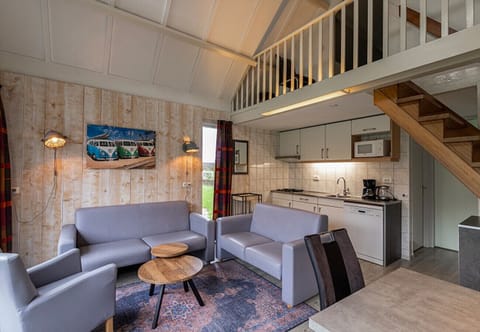 Bungalowpark Simpelveld – Delta 108 EEZZ Living room kitchen dining table