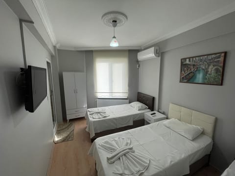 Standard Triple Room, City View | Soundproofing, free WiFi