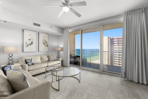 Relax in this modern living room with ocean views through large sliding glass doors.