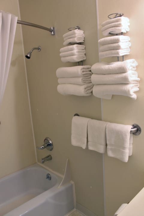 Standard Room, Multiple Beds | Bathroom amenities | Free toiletries, hair dryer, towels, soap