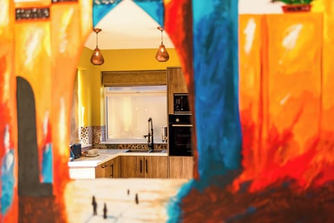 Suite, 1 King Bed, Private Bathroom, Courtyard View | Private kitchen | Full-size fridge, microwave, oven, stovetop