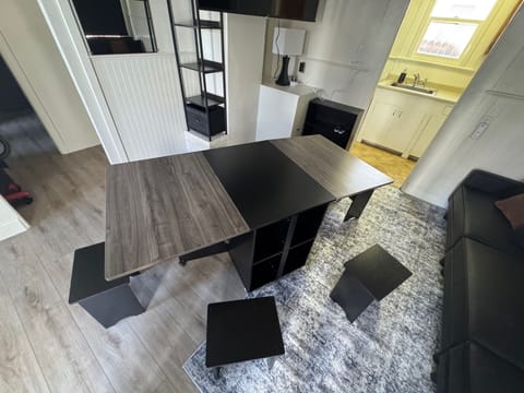 Wheeled Island/Coffee Table Transforms Quickly into Dining Table