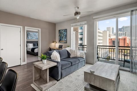 Beautifully designed living room. 75`Beautifully designed living room. 75` TV, Queen sleeper sofa and amazing views of mountains and city skyline. TV. Electric fireplace. Leather sofa and amazing views of mountains and city skyline.