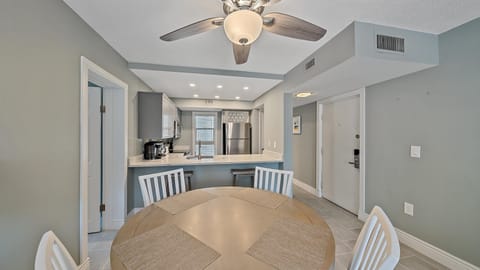 Enjoy easy entertaining with the central family dining table providing plenty of space for meals, perfectly situated next to the gorgeous fully renovated kitchen of your Longboat Key retreat.