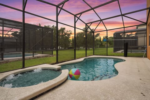 Grab a drink and sit by the relaxing pool!