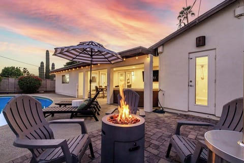 Plenty of back yard fun with fire pits, putting green and more