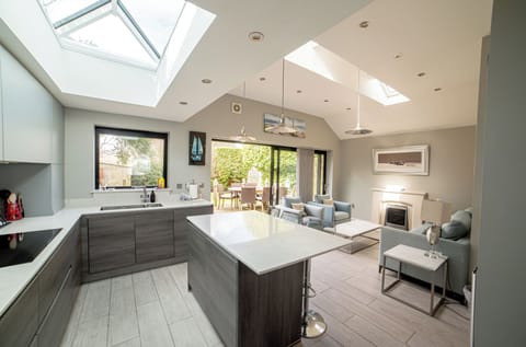 Kitchen and rear living room leading to garden