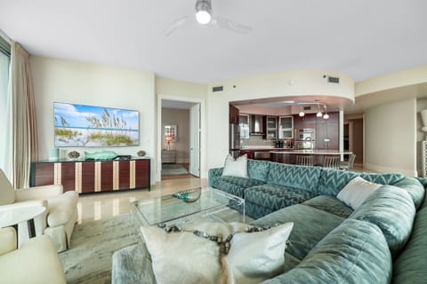 This thoughtfully designed living space maximizes natural light and integrates seamlessly with the surrounding environment. The open-concept layout and expansive windows create a bright and airy atmosphere.