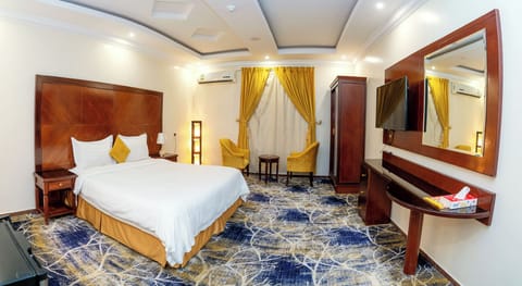 In-room safe, laptop workspace, blackout drapes, soundproofing