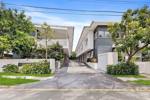 Leafy Camp Hill townhouse with driveway access and secure garage parking.