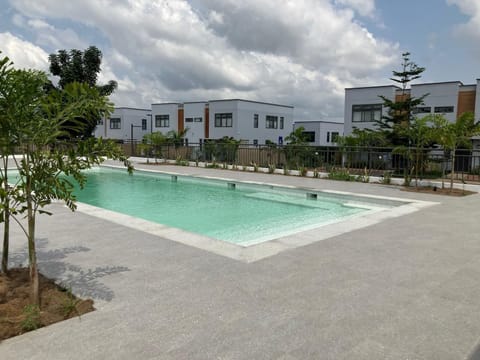 Outdoor exclusive communal pool with sun loungers 