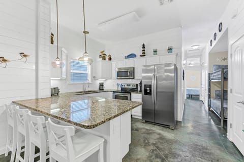 Kitchen - Gather around the island for snacks, cocktails, and good conversation with seating for 4