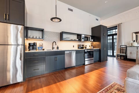 Fully equipped kitchen with modern appliances, offering everything you need for preparing meals or enjoying a morning coffee.