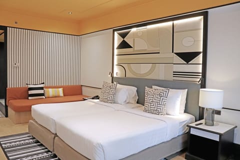 Superior Twin Room | Minibar, in-room safe, laptop workspace, blackout drapes