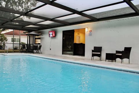 Soak up the sun and take a dip in the heated pool, offering comfort and warmth for the perfect outdoor escape