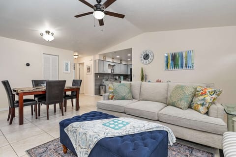 Spacious living room, dining room, dedicated workspace, and kitchen