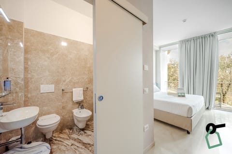 Classic Double Room, Balcony | Bathroom | Shower, free toiletries, hair dryer, towels
