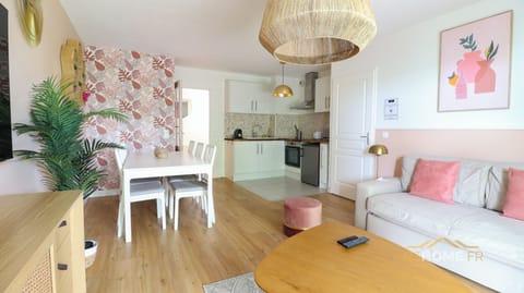 Deluxe Apartment, Garden View | Living area | 119-cm Smart TV with digital channels