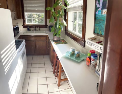 Purple Parrot Cottage | Private kitchen | Dining tables