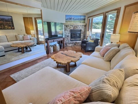 Spacious Living room with Fireplace and balcony