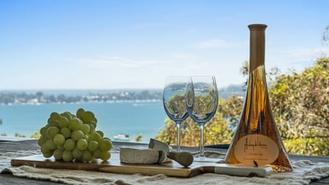 Unwind with a glass of wine in hand, as you take in the stunning, ever-changing views of the lake—pure tranquility.