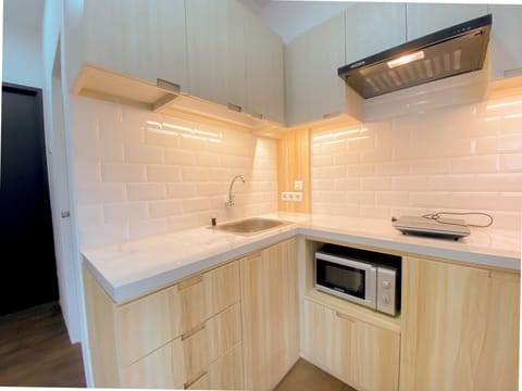 Apartment | Private kitchen | Full-size fridge, microwave, stovetop, rice cooker