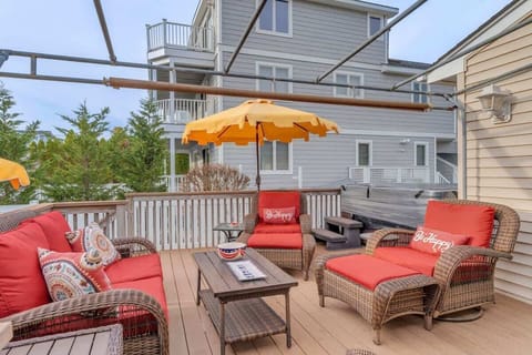 Relax on the spacious deck with comfortable outdoor seating, perfect for morning coffee or evening conversations.
