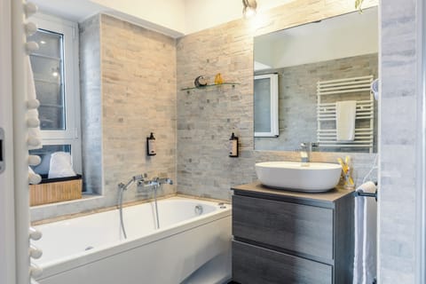 Luxury Quadruple Room, 2 Bedrooms, Garden View | Bathroom | Hair dryer, slippers, electronic bidet, towels