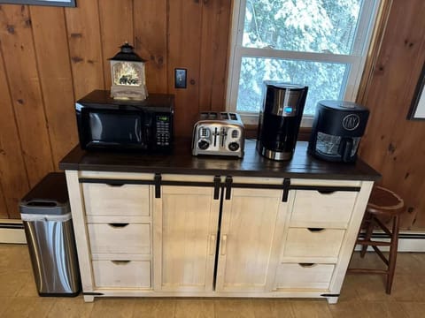 Set for your next shared meal in a warm, wood-paneled atmosphere.