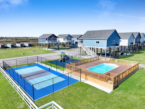 Community playground, pickle ball court and pool