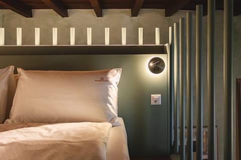 Premium bedding, down comforters, pillowtop beds, desk