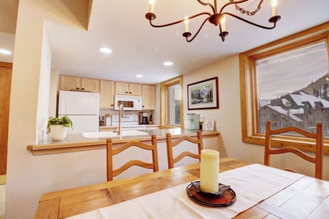 Dining room table looking towards the kitchen.