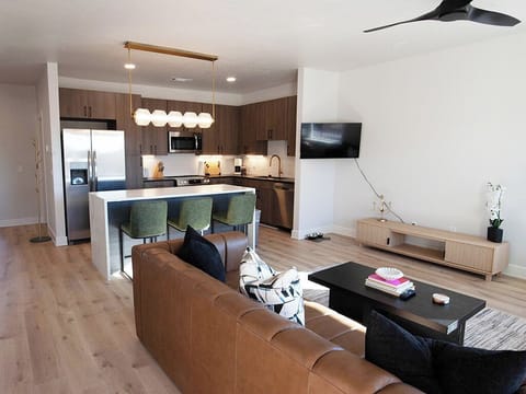 Deluxe Apartment, City View | Living area | TV