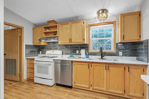 Kitchen with Full Size Appliances Including Dishwasher, as well as Keurig, Drip Coffee Maker, French Press, Espresso Maker, K-Cups, Electric Kettle, Blender, Toasters