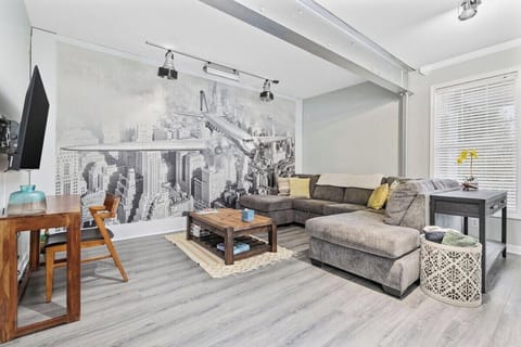 Kick back and relax—this cozy living room is made for movie nights and lazy mornings.