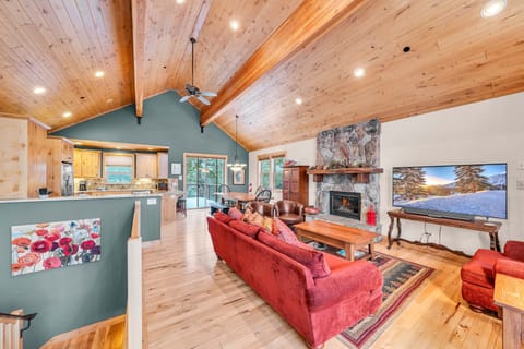 Living room: Main floor, gas fireplace, Smart TV, central heat, no A/C, deck access
