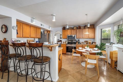 Fully equipped kitchen with plenty of counter space and seating for six.