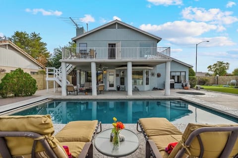 Backyard Bliss – Relax in this entertainer's dream backyard with a pool, spa, and endless amenities.